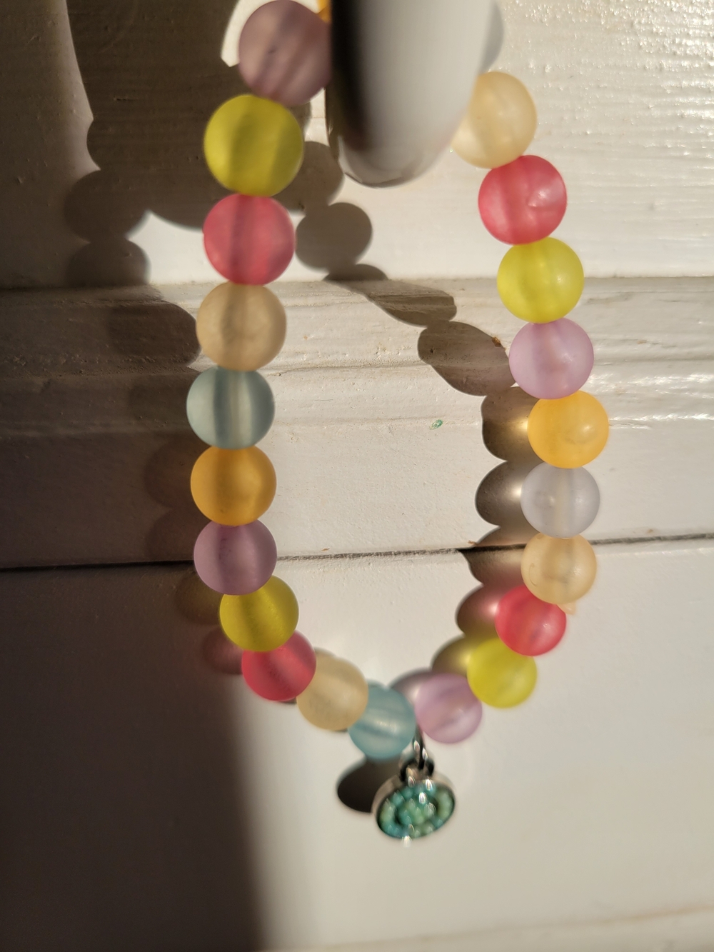Plastic, Pastel Colour Bracelet With A Charm